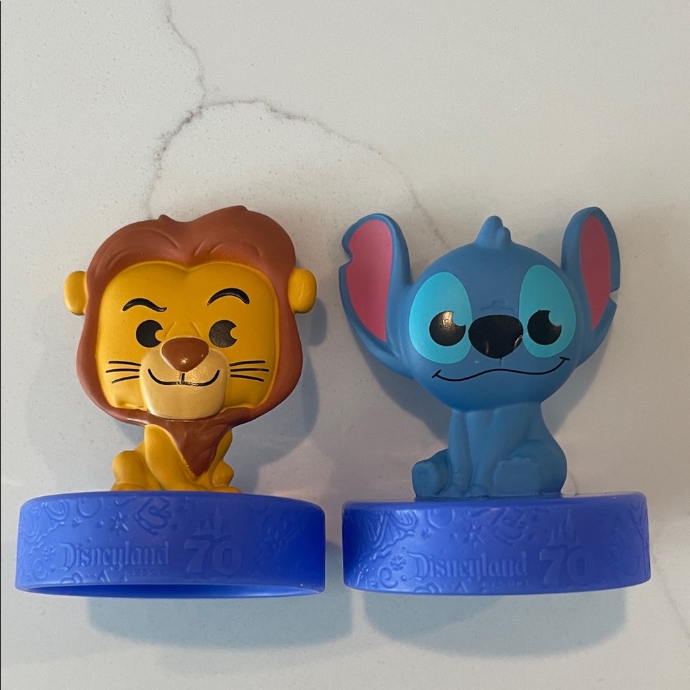 Disney 70th Anniversary Mufasa and Stitch Figurine Set.